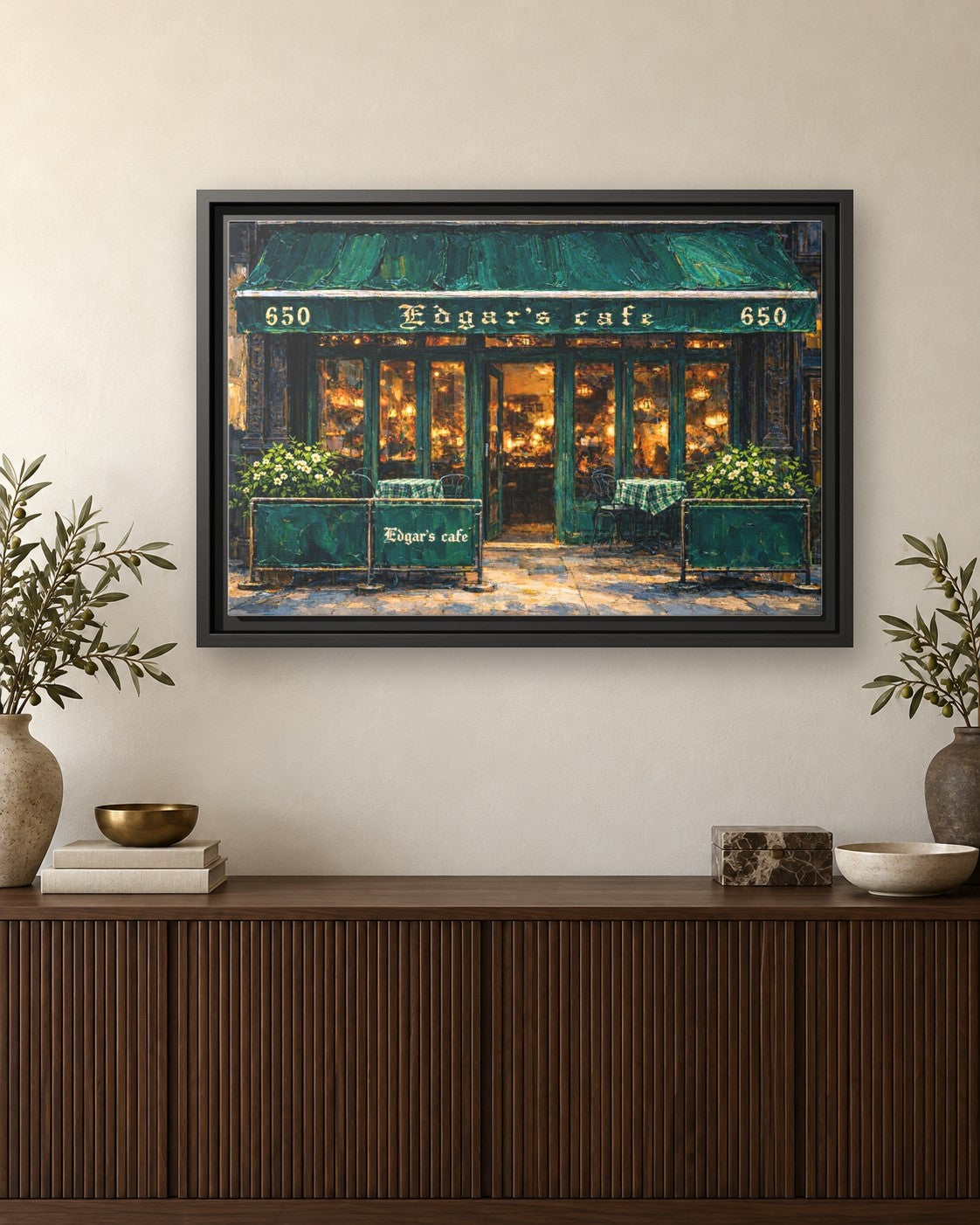 Edgar's Cafe framed canvas print hanging above a credenza
