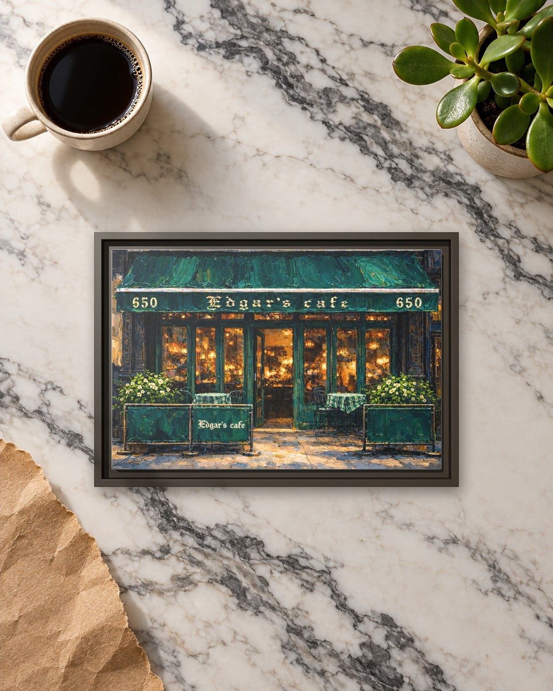 Edgar's Cafe framed canvas print lying on a table