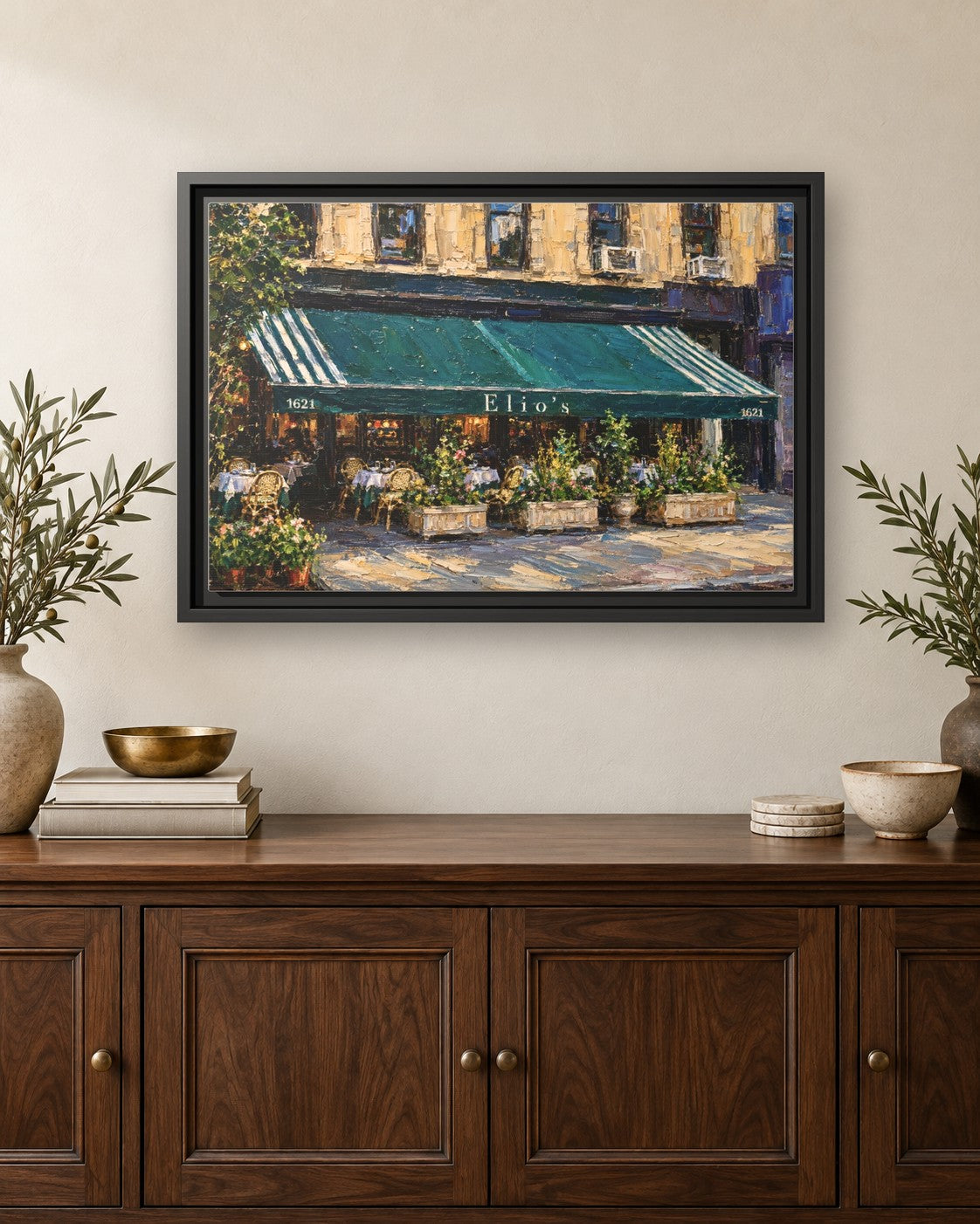 Elio's framed canvas print hanging above a credenza