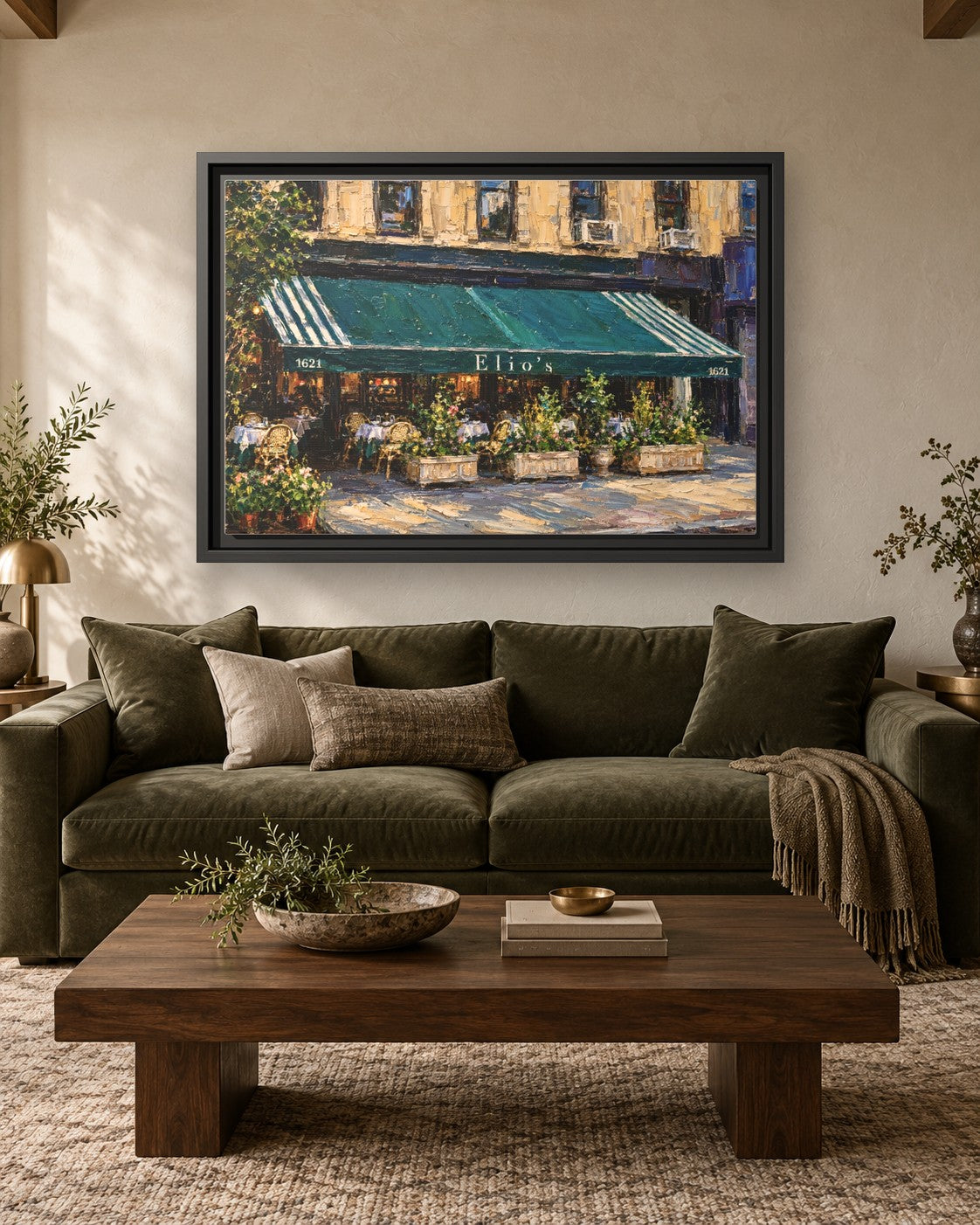 Elio's framed canvas print hanging above a sofa
