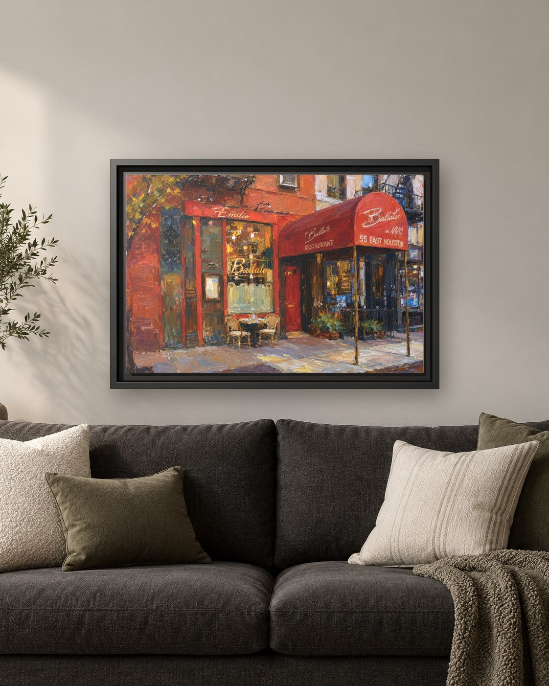 Emilio's Ballato framed canvas print hanging above a sofa