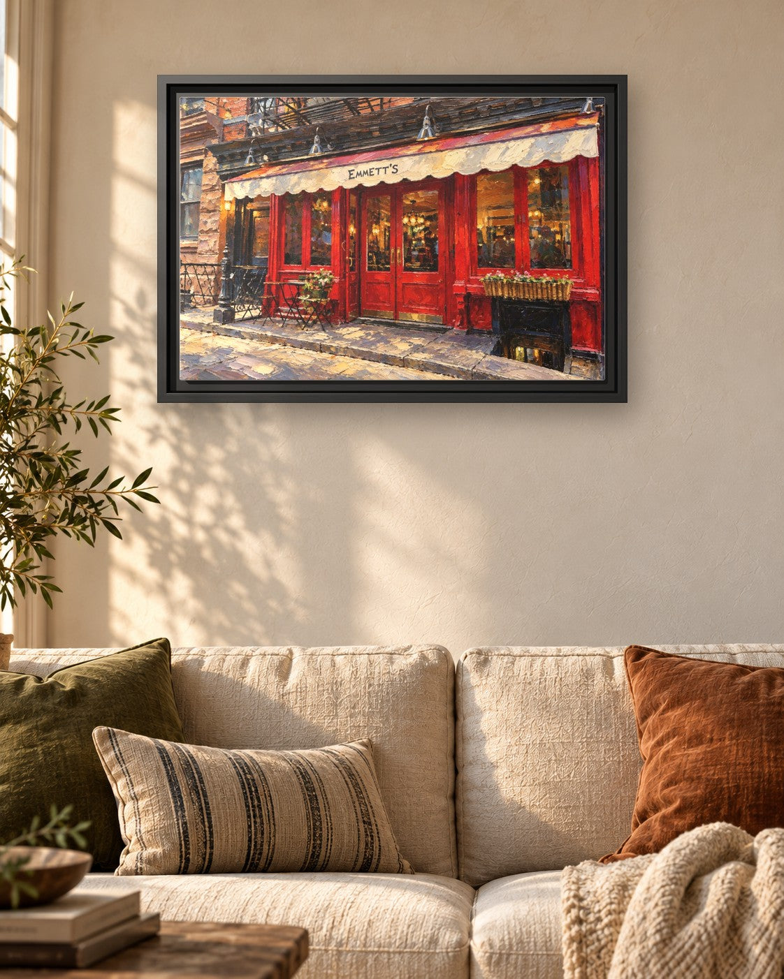 Emmett's framed canvas print hanging above a sofa