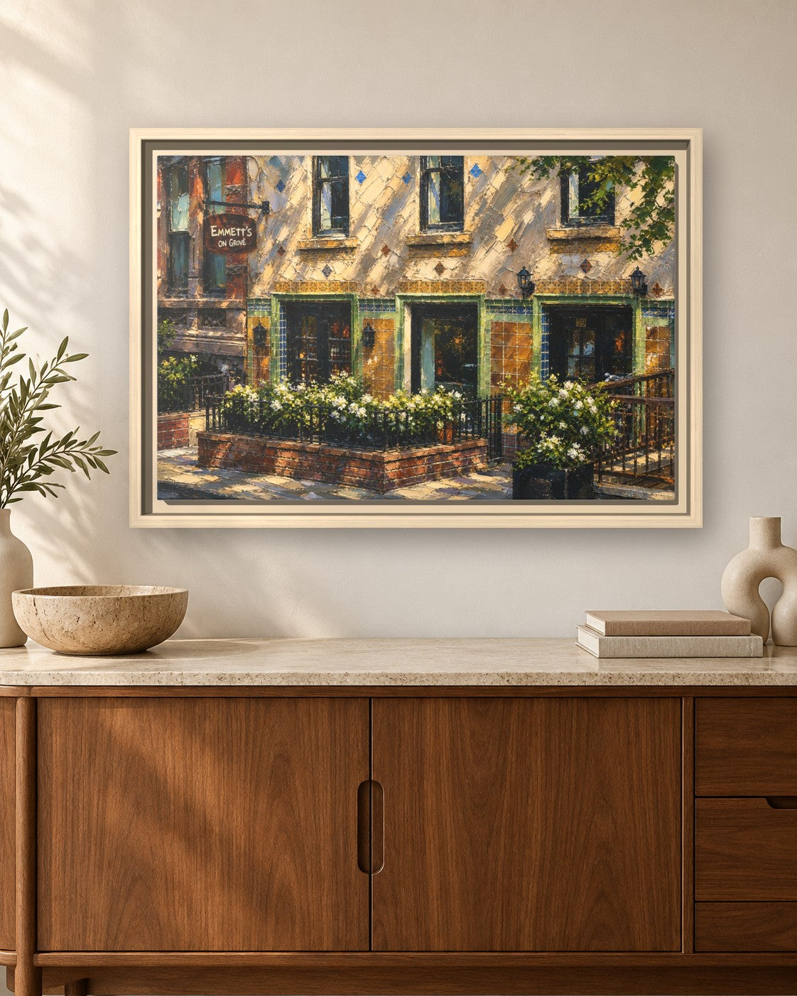 Emmett's on Grove framed canvas print hanging above a sideboard