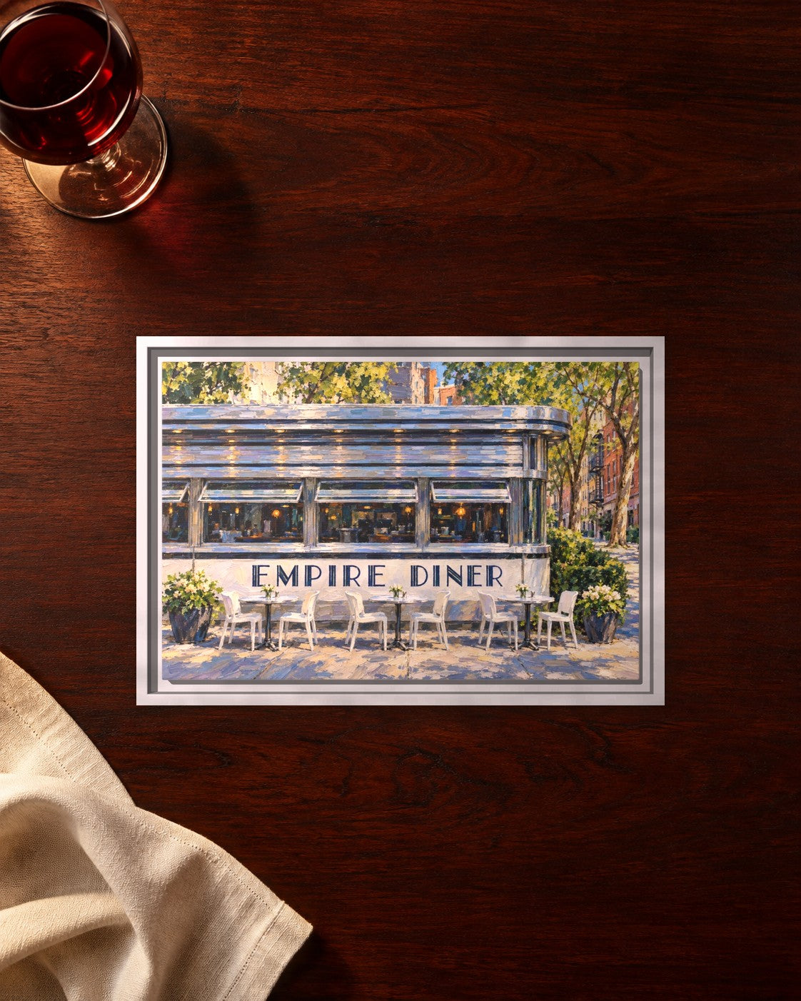 Empire Diner framed canvas print lying on a table