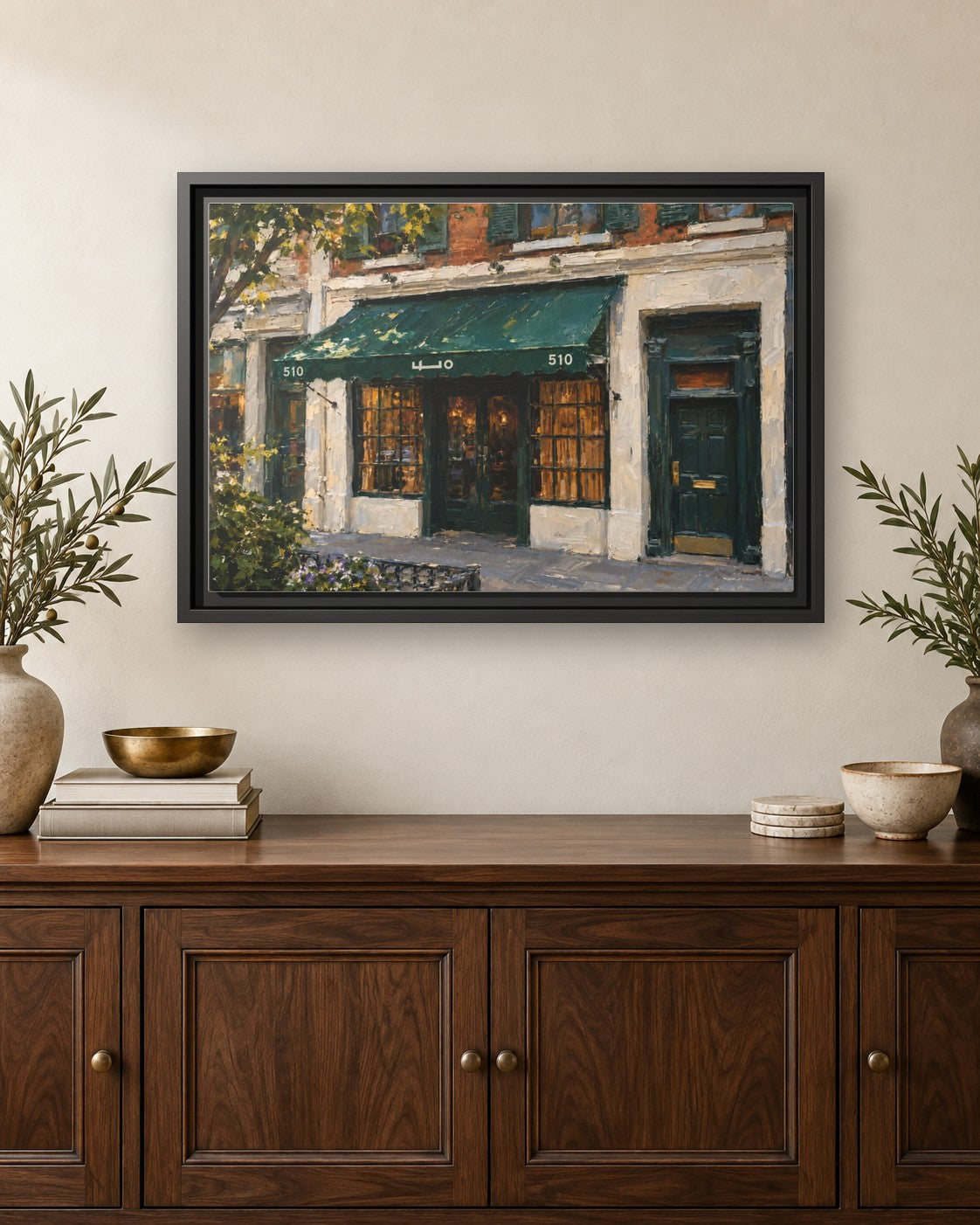 Employees Only framed canvas print hanging above a credenza