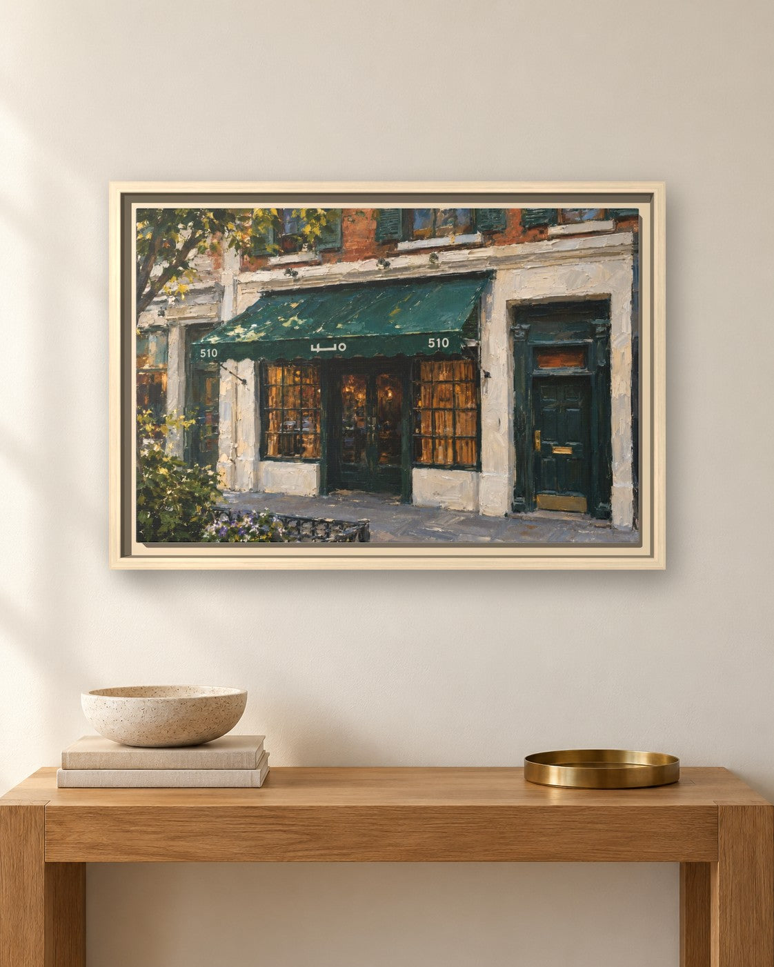 Employees Only framed canvas print hanging above a sideboard
