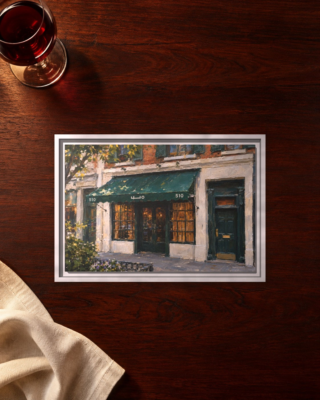 Employees Only framed canvas print lying on a table