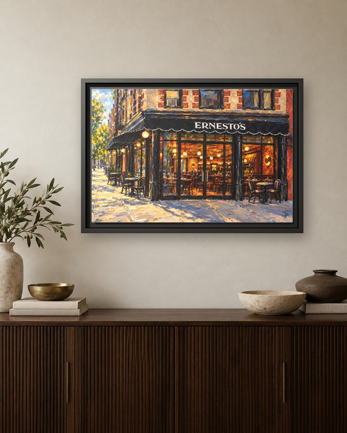 Ernesto's framed canvas print hanging above a credenza