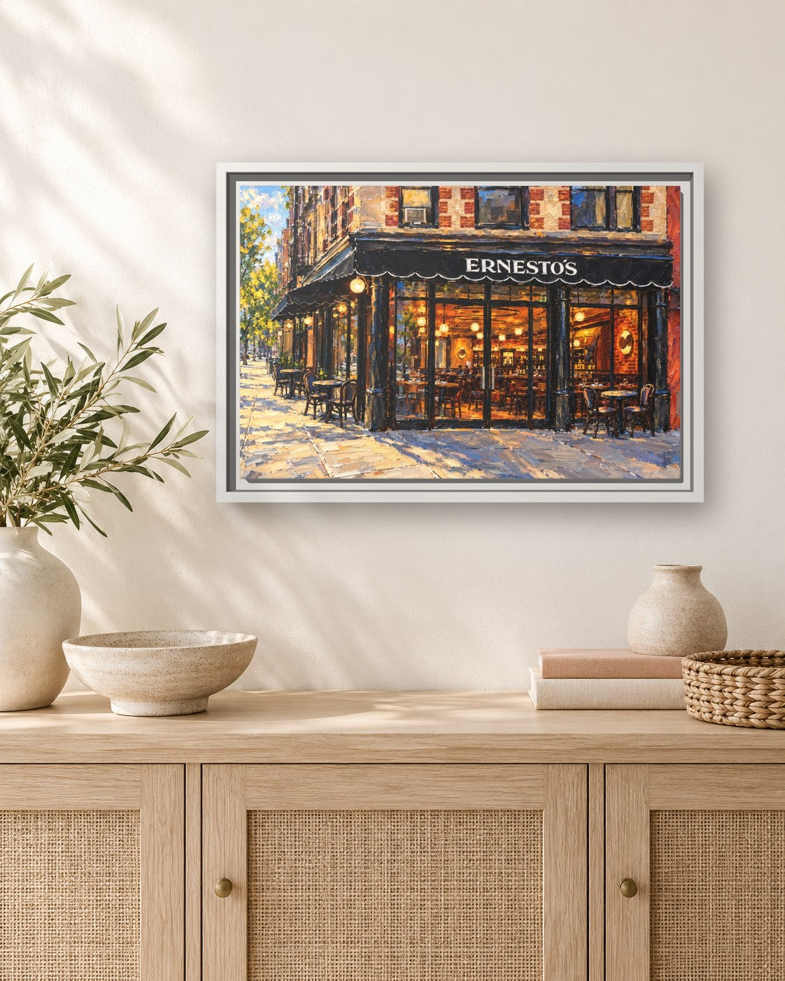 Ernesto's framed canvas print hanging above a sideboard