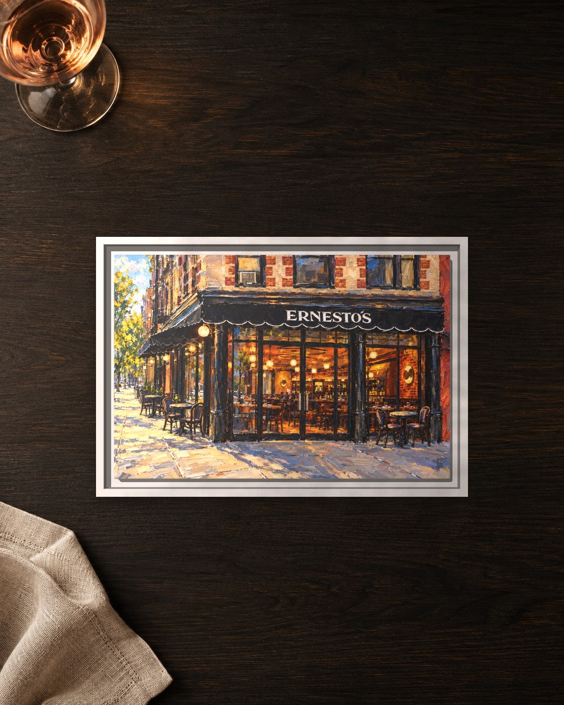 Ernesto's framed canvas print lying on a table