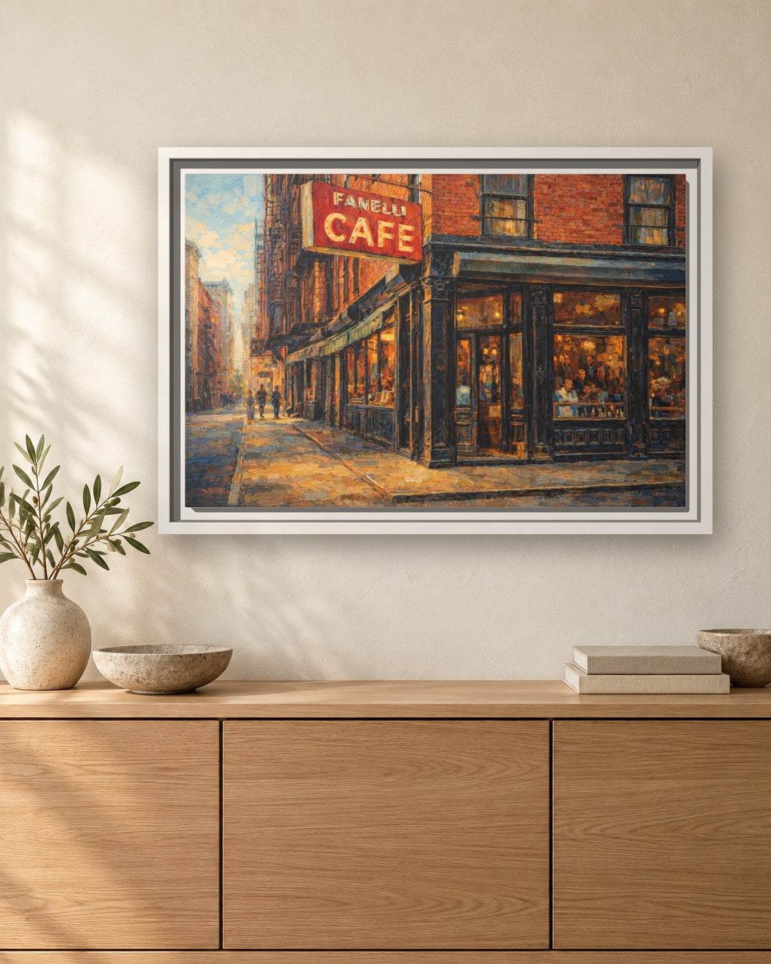 Fanelli Cafe framed canvas print hanging above a sideboard