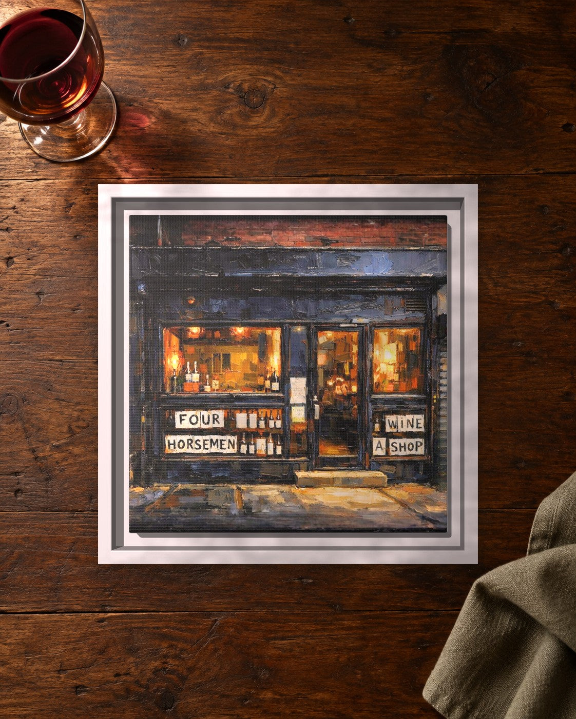 The Four Horsemen framed canvas print lying on a table