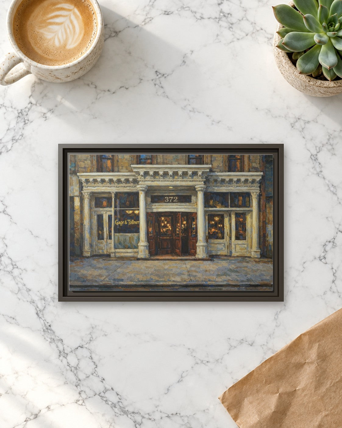 Gage & Tollner framed canvas print lying on a table