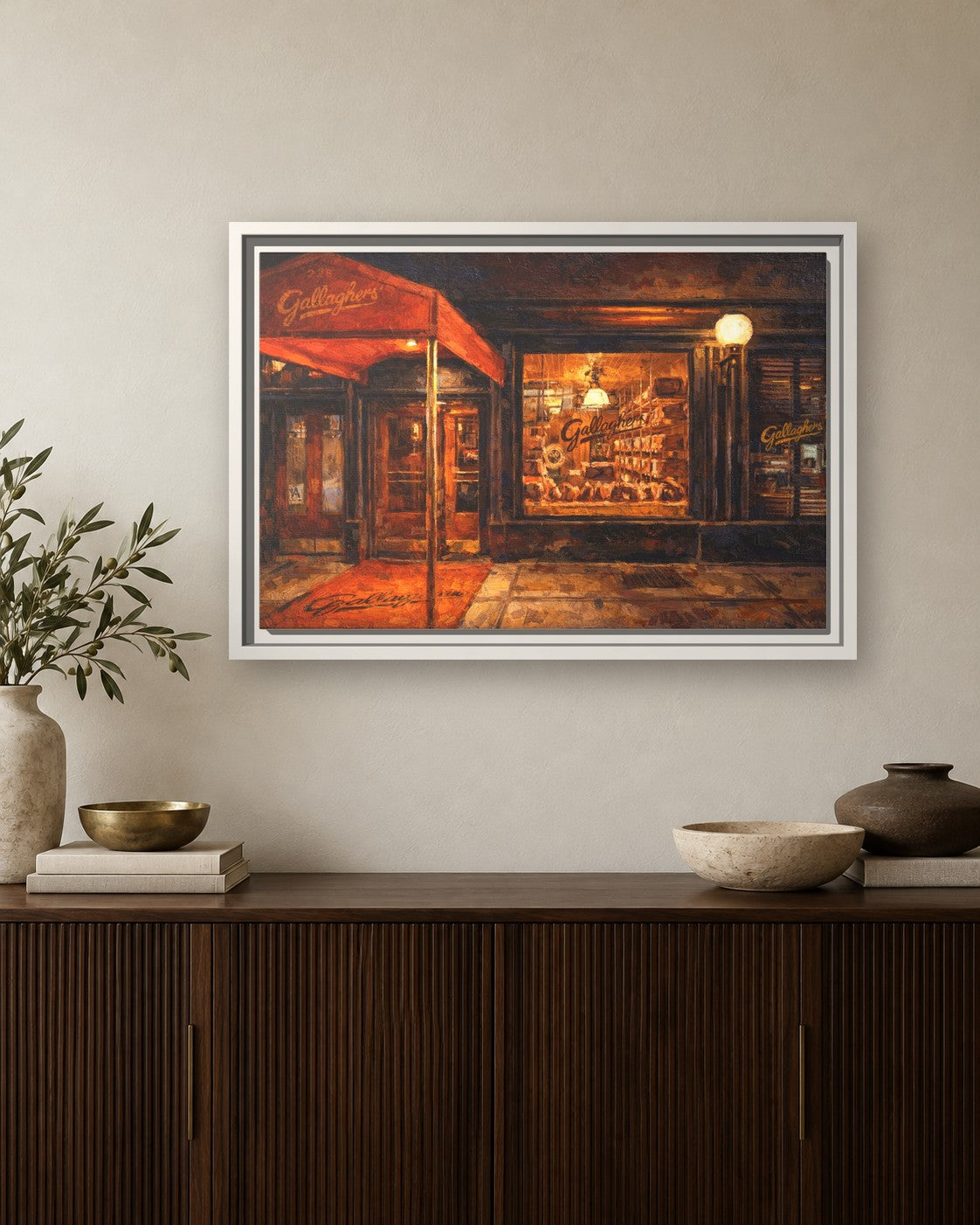 Gallaghers Steakhouse framed canvas print hanging above a sideboard