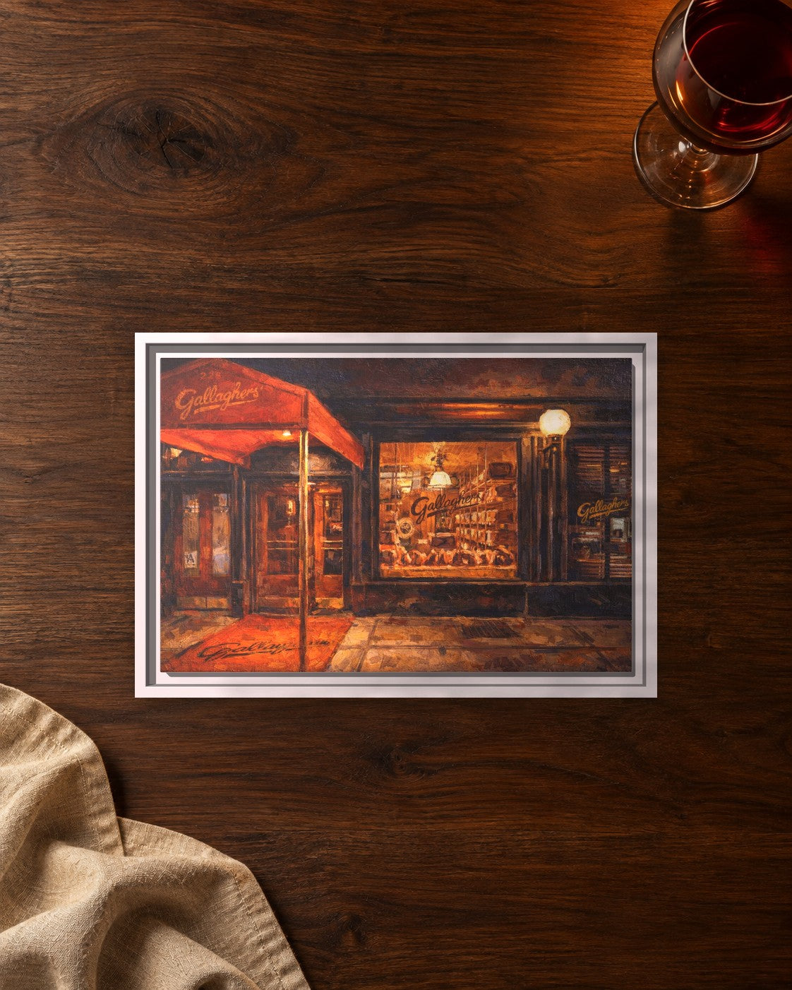 Gallaghers Steakhouse framed canvas print lying on a table