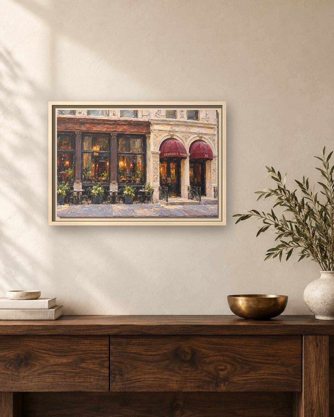 Gramercy Tavern framed canvas print hanging above a sideboard