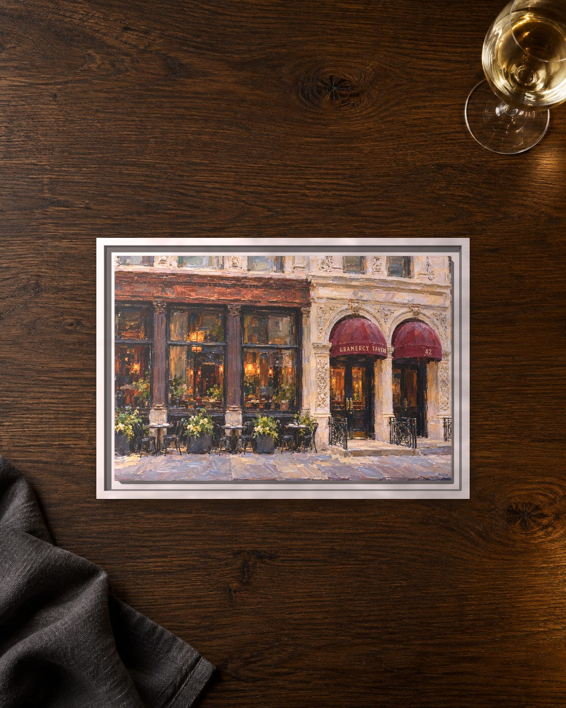 Gramercy Tavern framed canvas print lying on a table