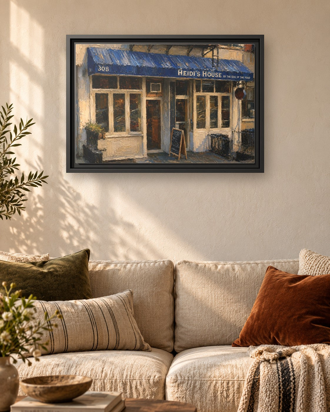 Heidi's House by the Side of the Road & Ed's Elbow Room framed canvas print hanging above a sofa
