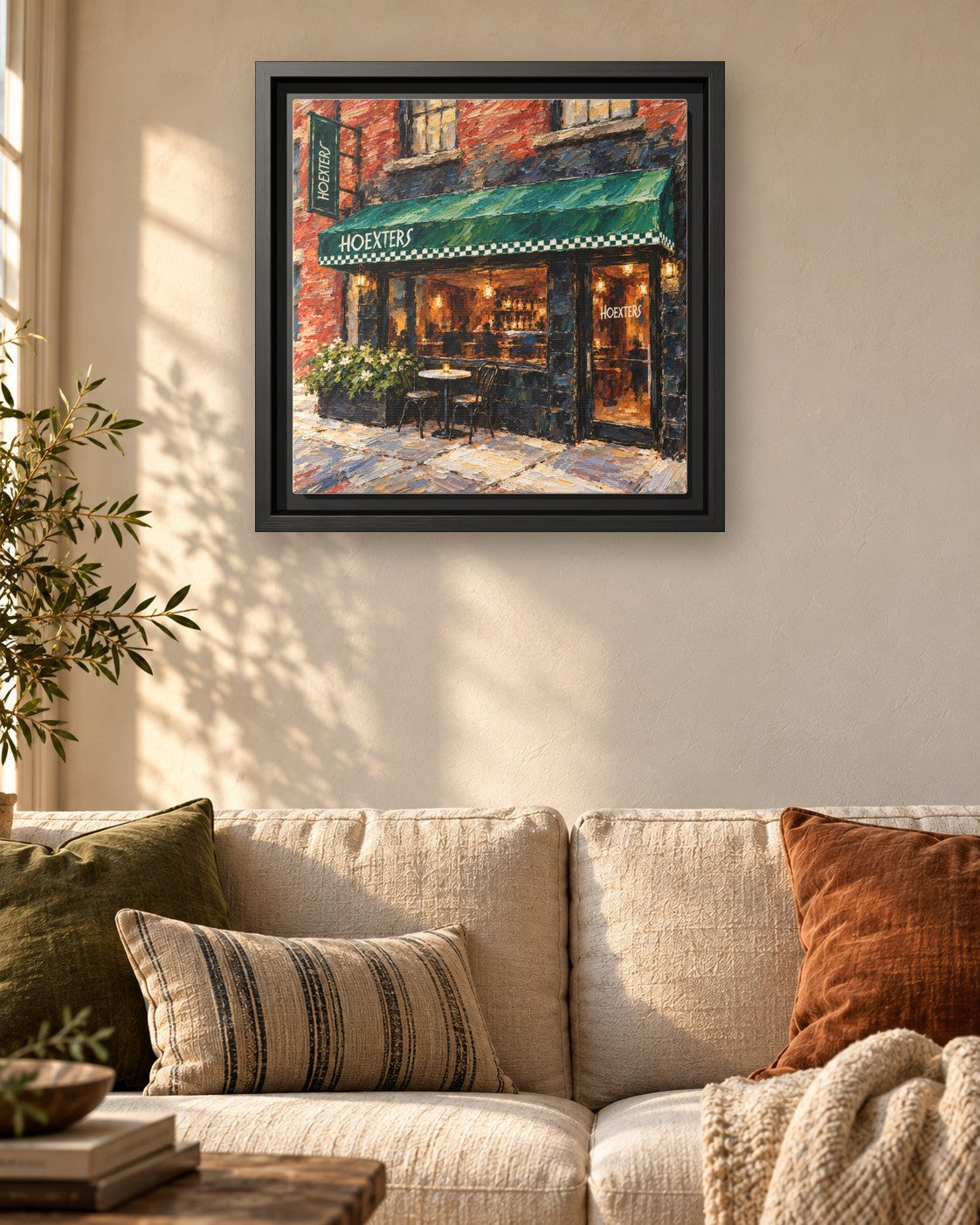 Hoexters framed canvas print hanging above a sofa