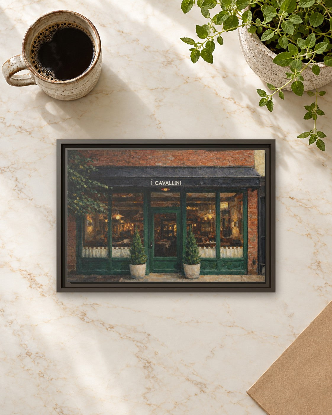 i Cavallini framed canvas print lying on a table