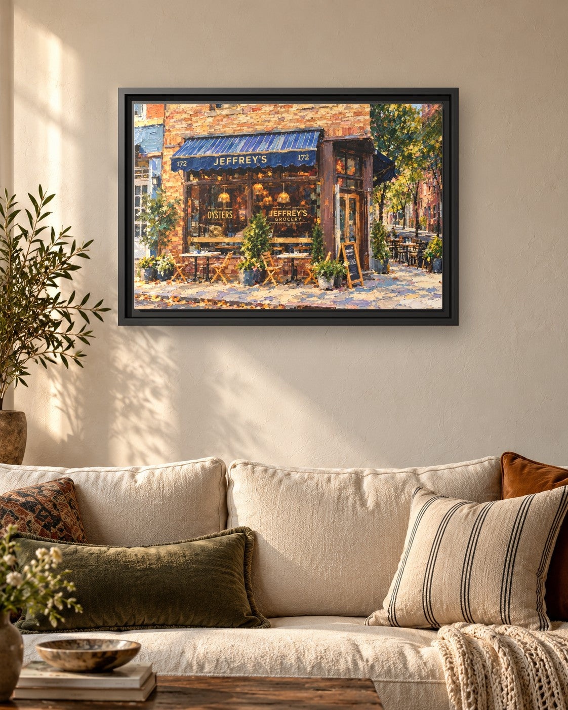 Jeffery's Grocery framed canvas print hanging above a sofa