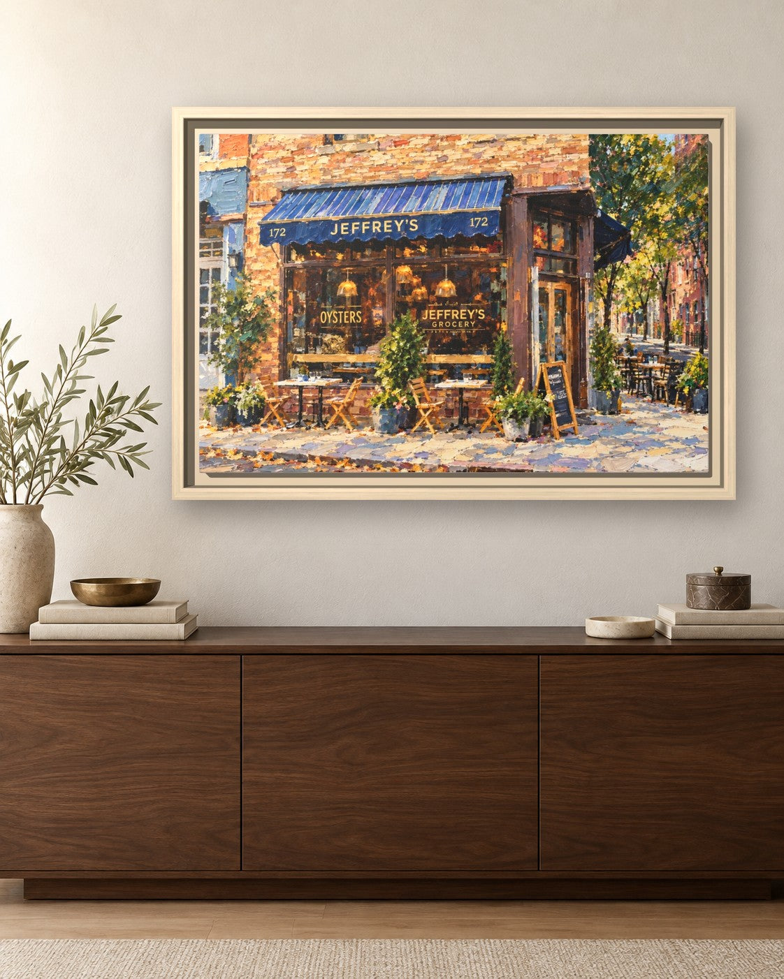 Jeffery's Grocery framed canvas print hanging above a sideboard