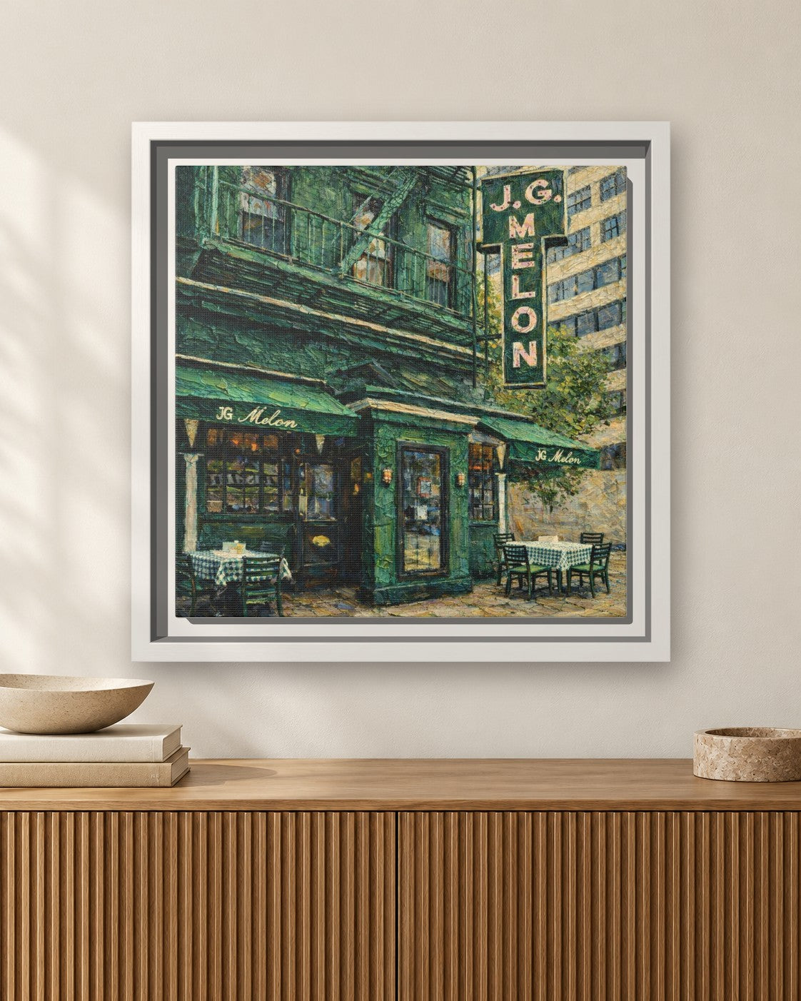 JG Melon framed canvas print hanging above a sideboard