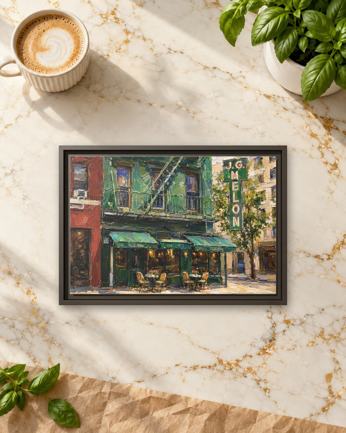 JG Melon framed canvas print lying on a table