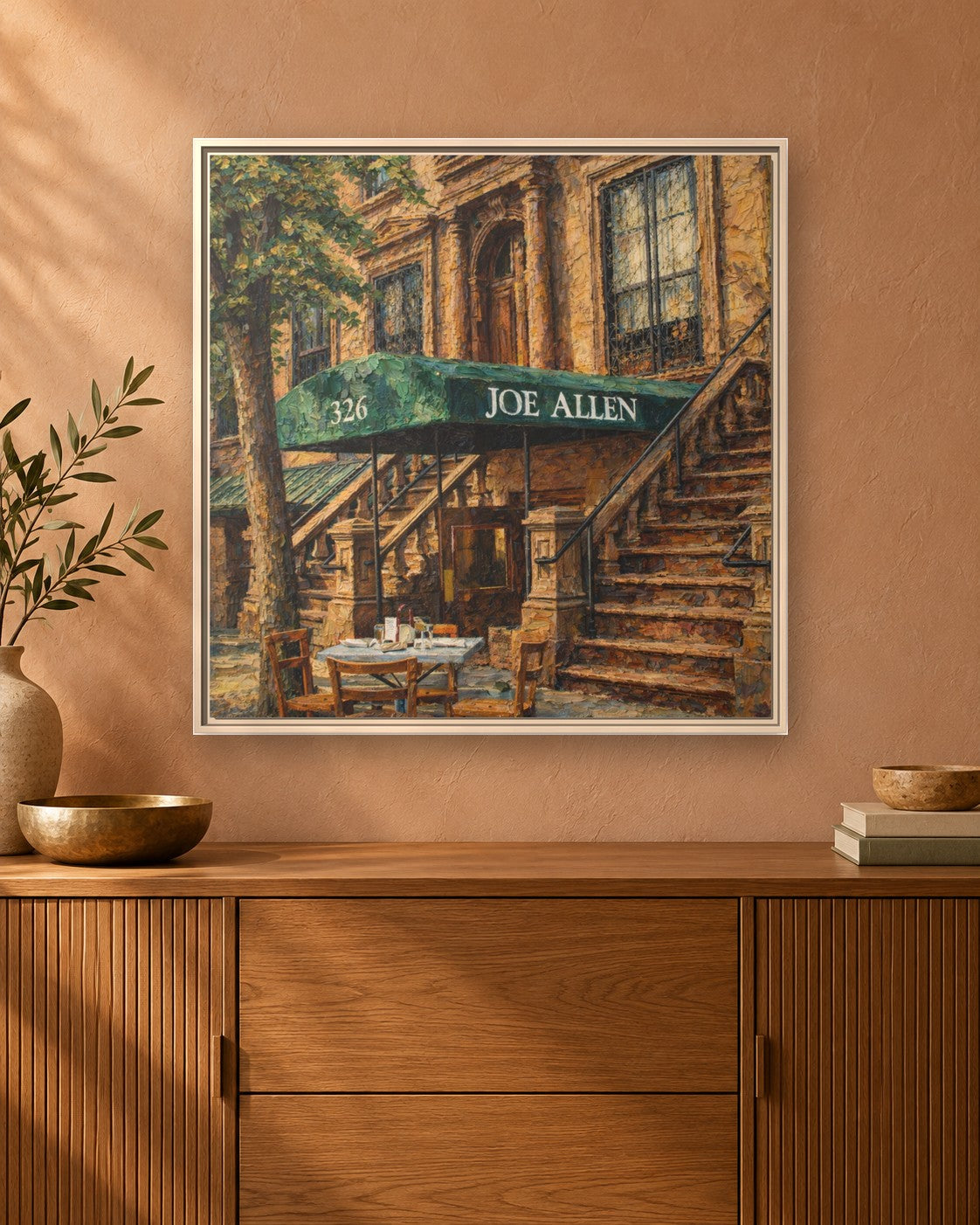 Joe Allen framed canvas print hanging above a sideboard