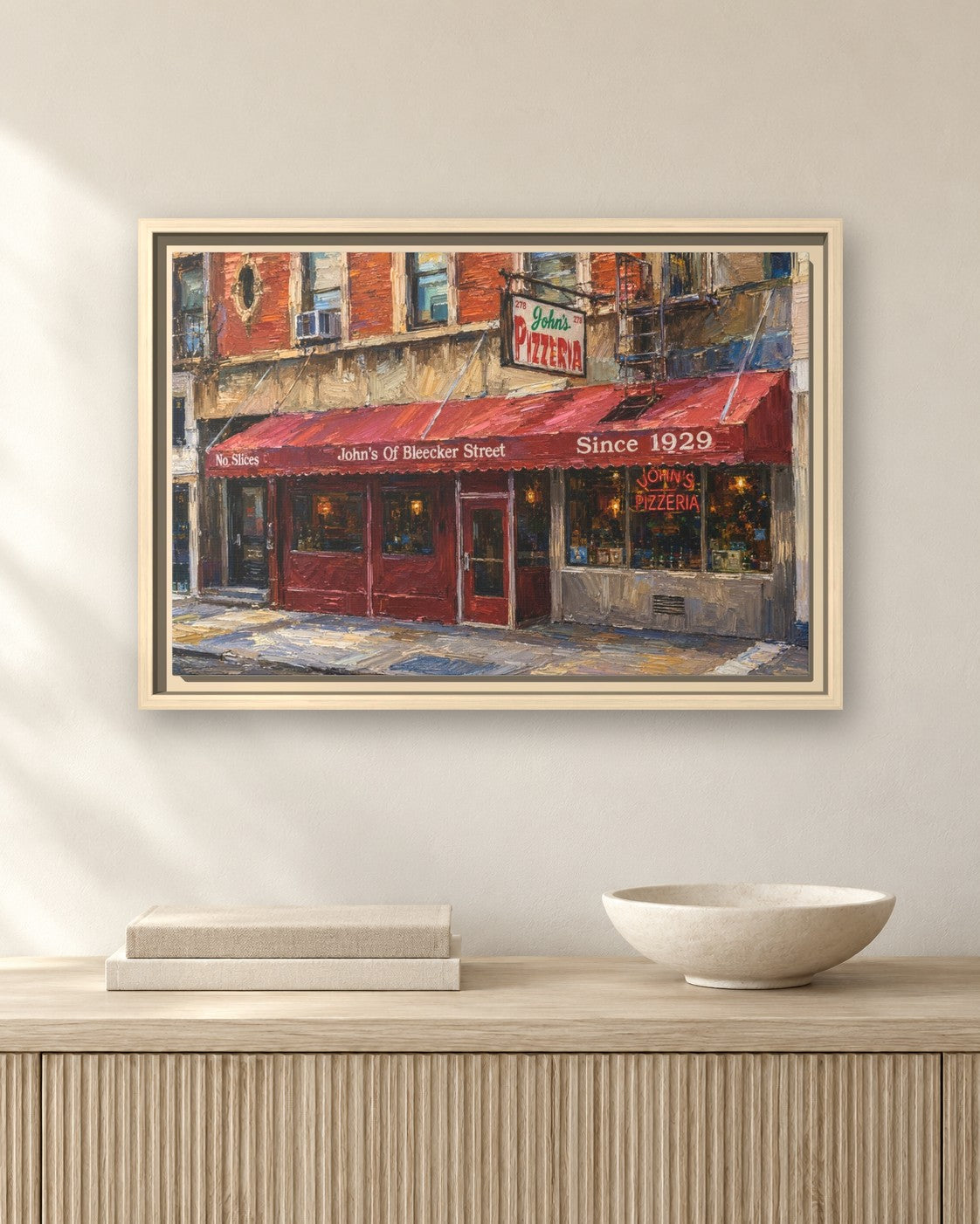 John's of Bleecker Street framed canvas print hanging above a sideboard