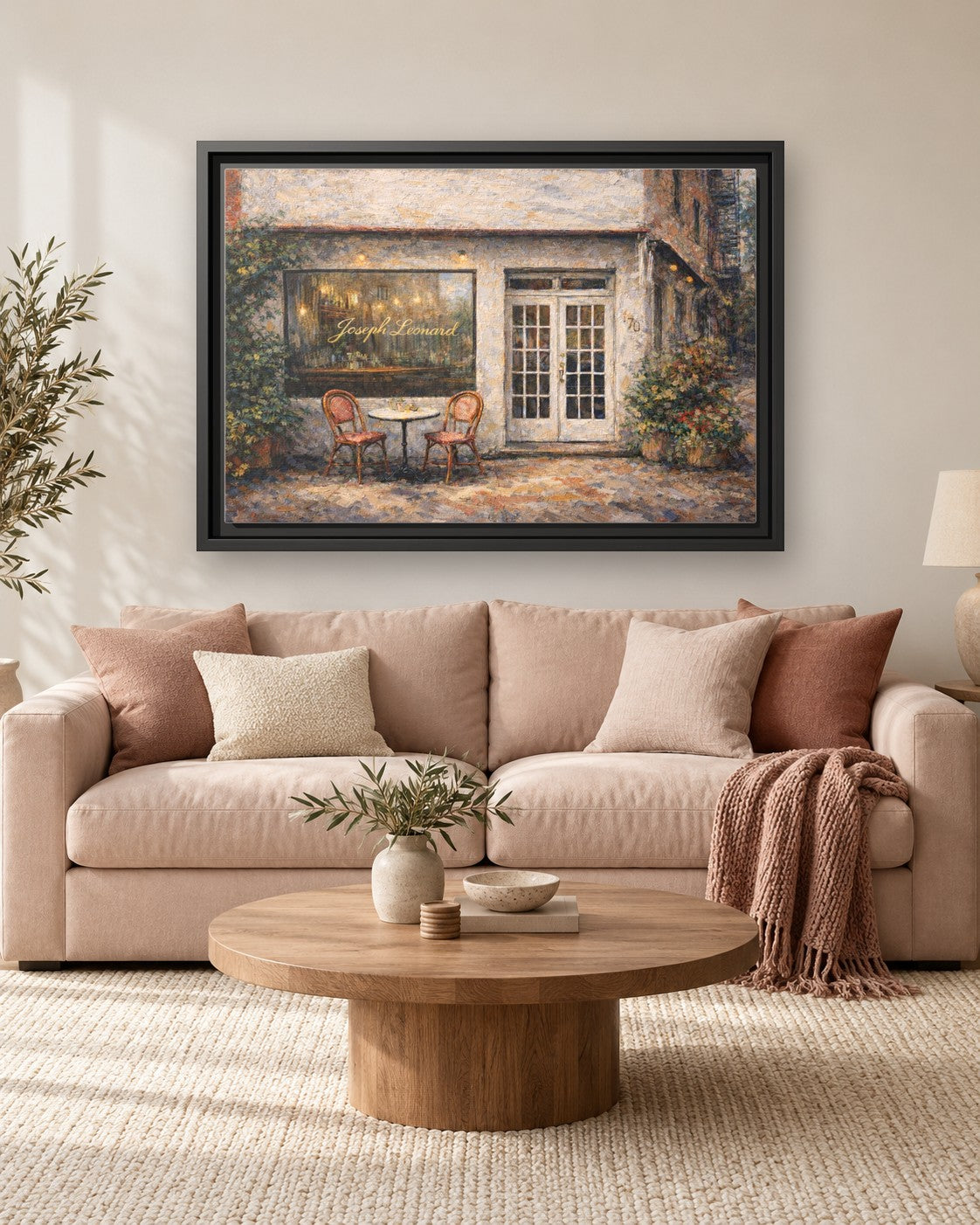 Joseph Leonard framed canvas print hanging above a sofa