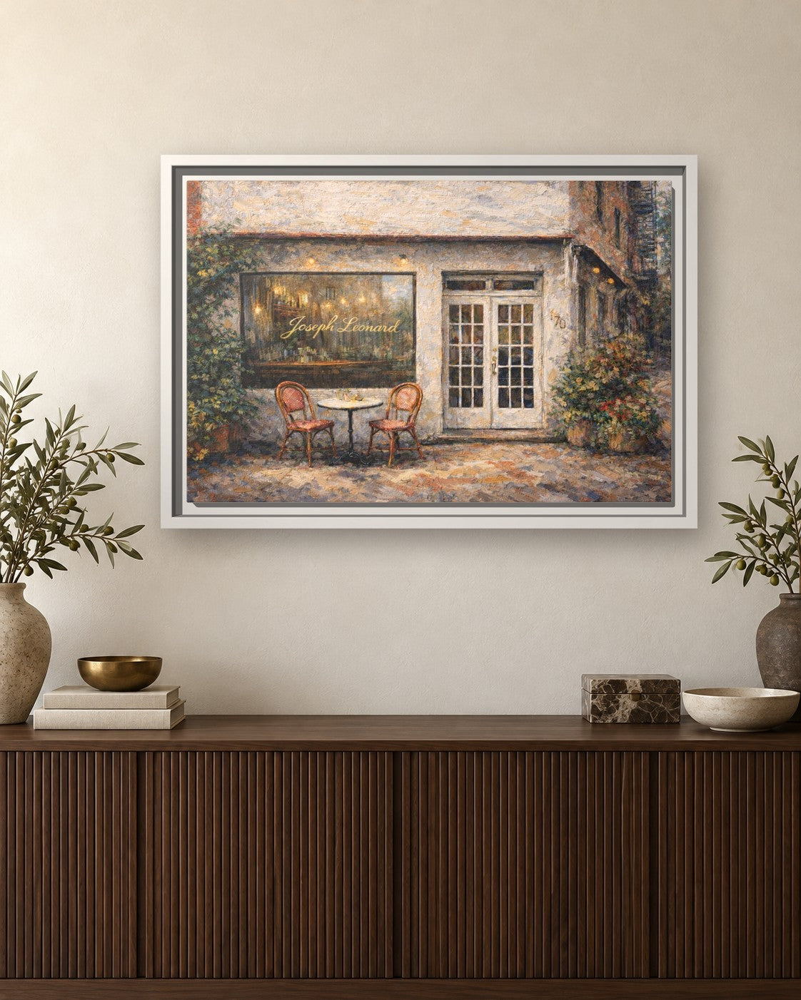 Joseph Leonard framed canvas print hanging above a sideboard