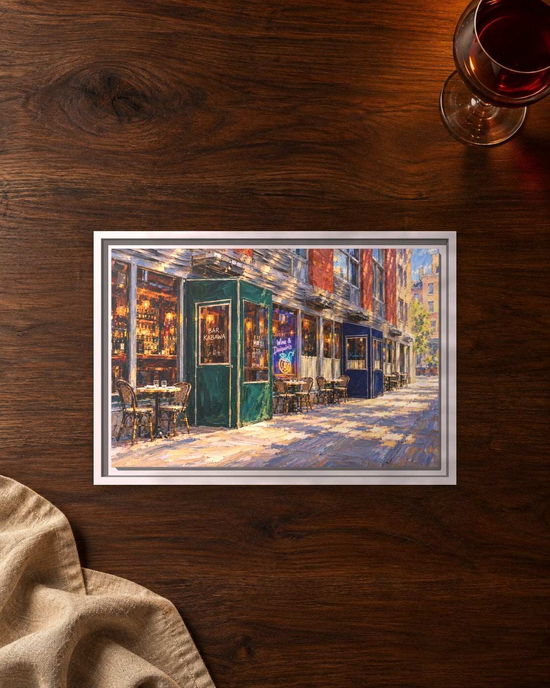 Kabawa framed canvas print lying on a table
