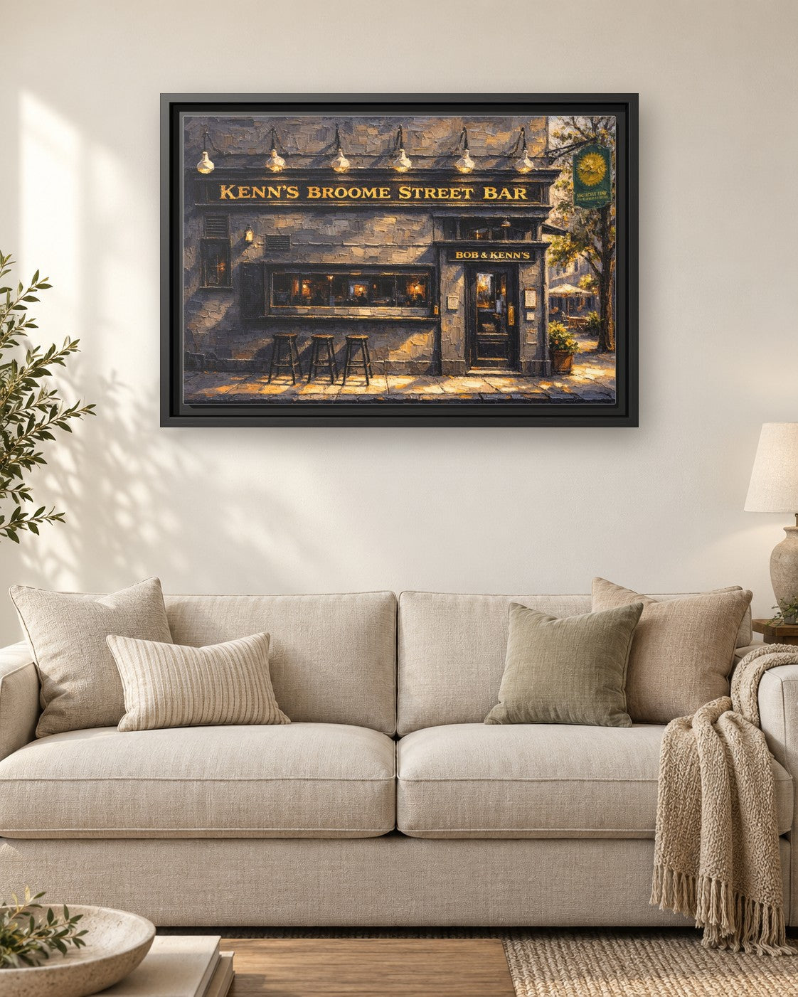 Ken's Broom Street Bar framed canvas print hanging above a sofa