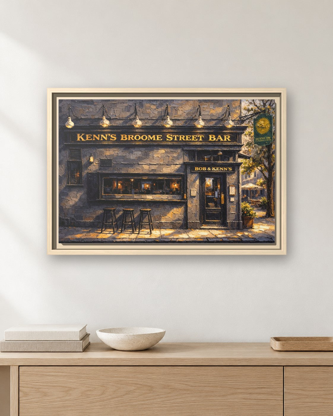 Ken's Broom Street Bar framed canvas print hanging above a sideboard