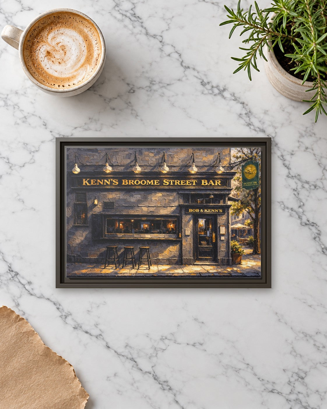Ken's Broom Street Bar framed canvas print lying on a table