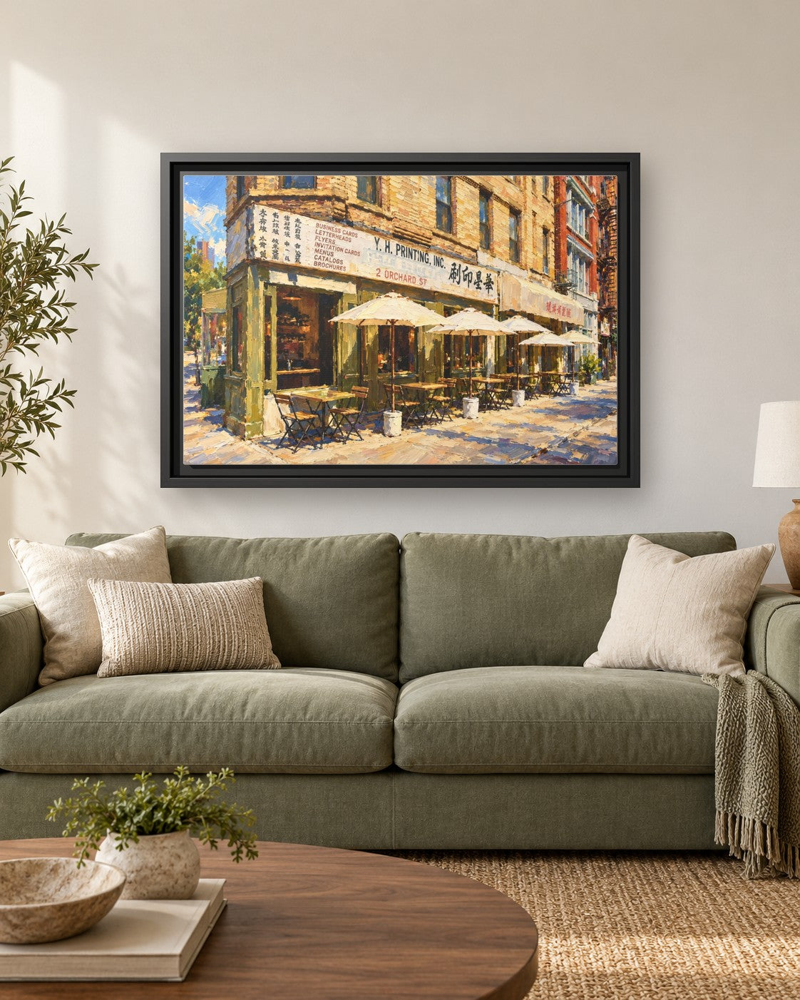 Kiki's framed canvas print hanging above a sofa