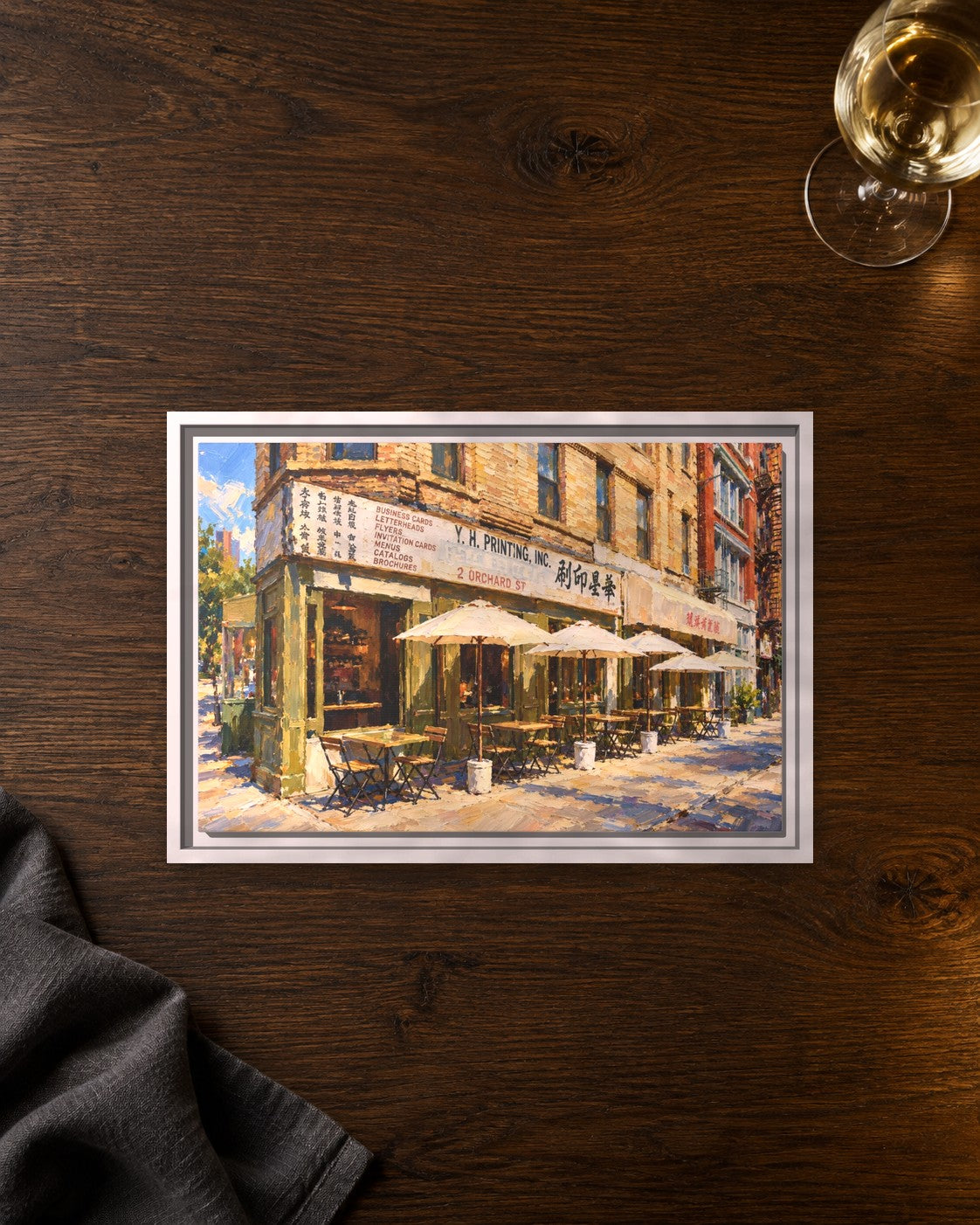 Kiki's framed canvas print lying on a table