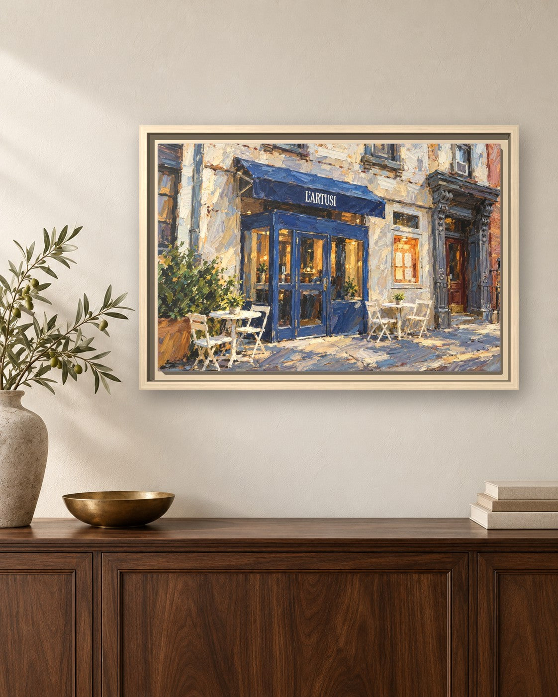 L'Artusi framed canvas print hanging above a sideboard
