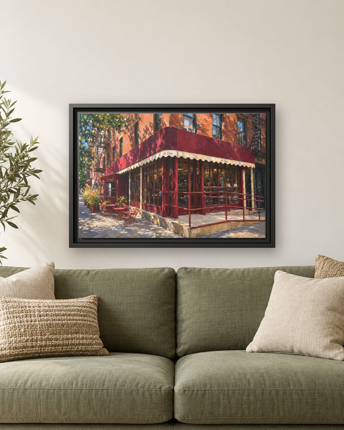 Le Dive framed canvas print hanging above a sofa