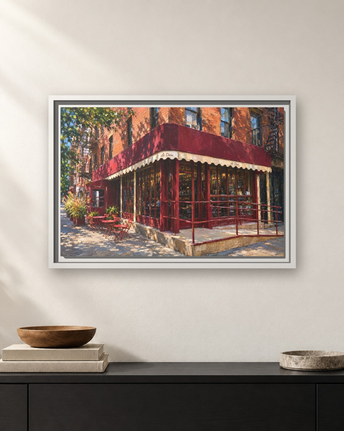 Le Dive framed canvas print hanging above a sideboard