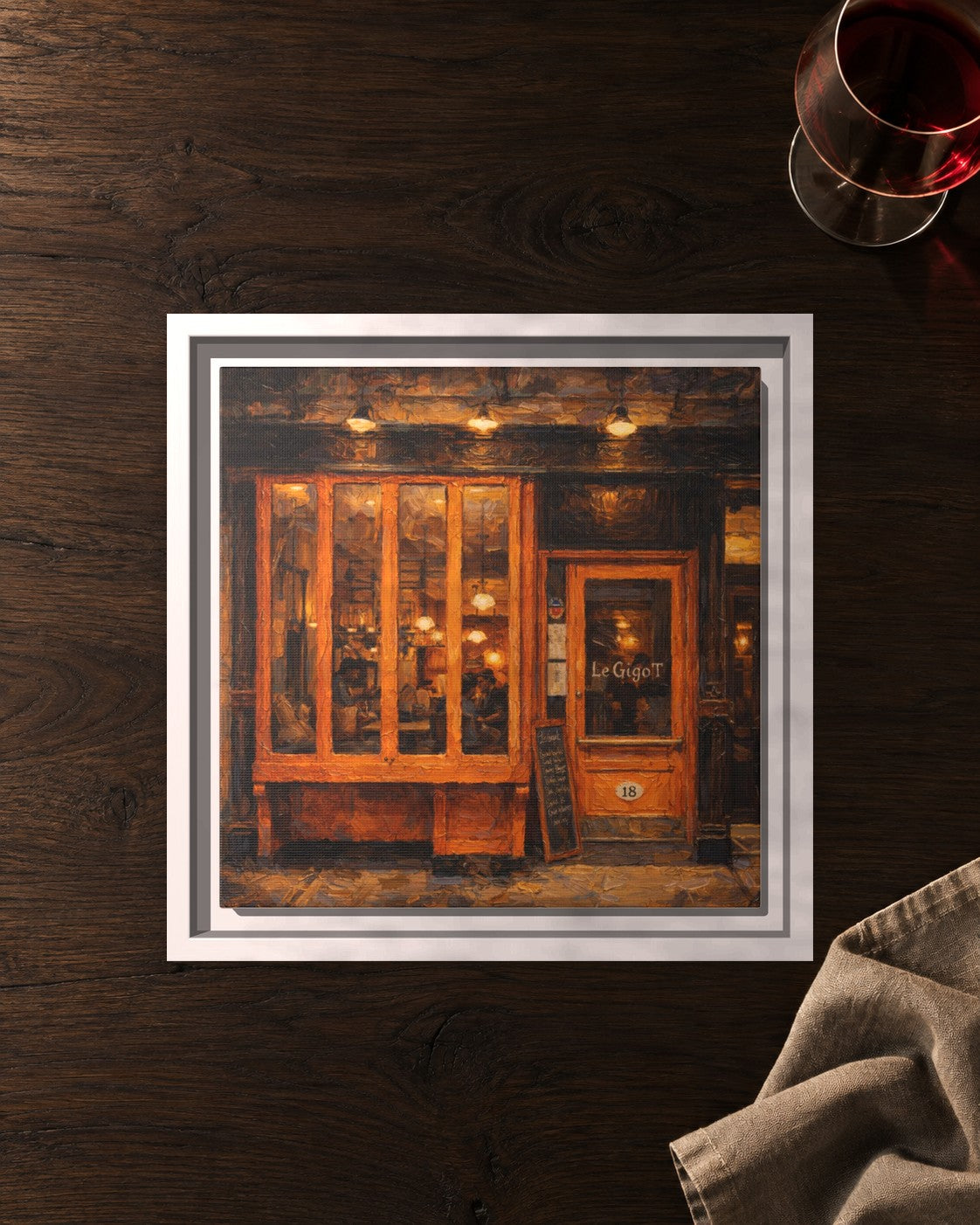 Le Gigot framed canvas print lying on a table