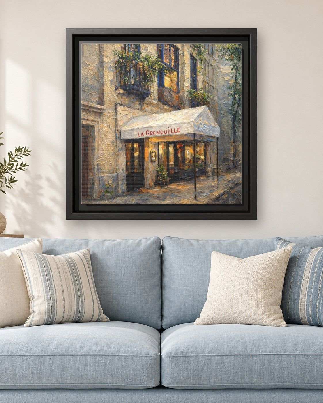 La Grenouille framed canvas print hanging above a sofa