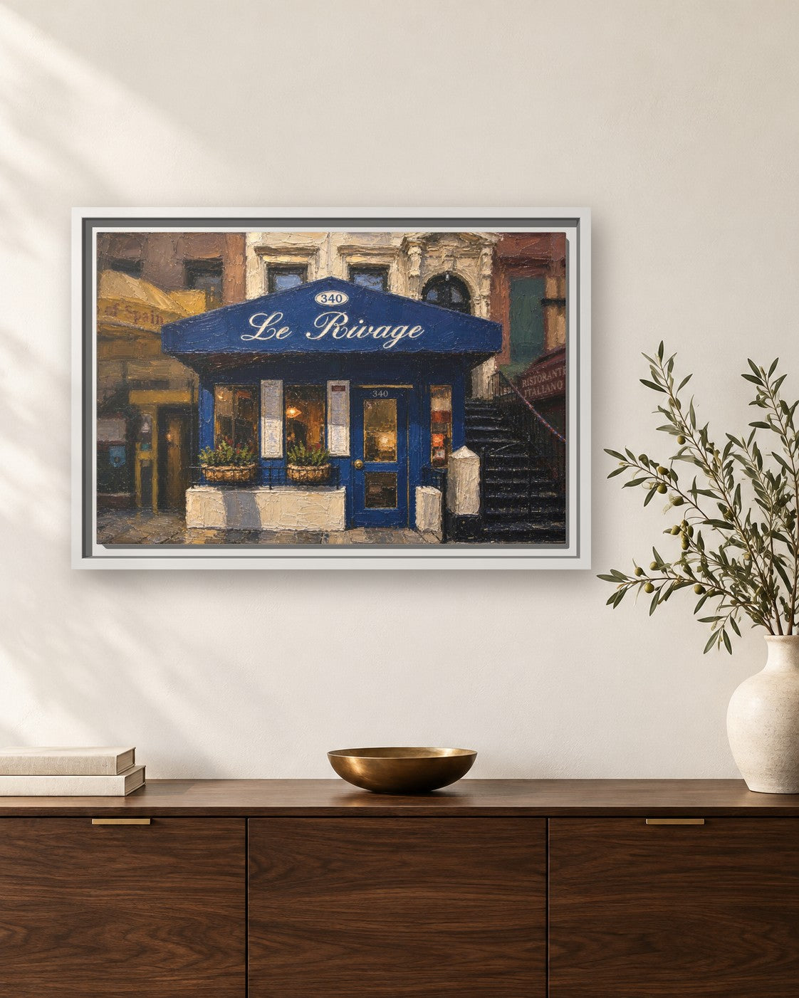 Le Rivage framed canvas print hanging above a sideboard