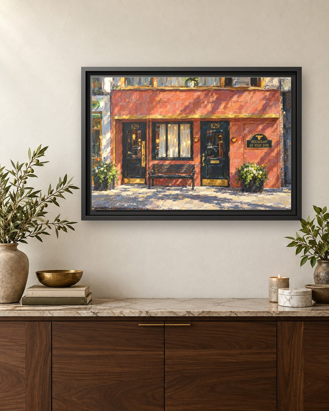 Le Veau d’Or framed canvas print hanging above a credenza