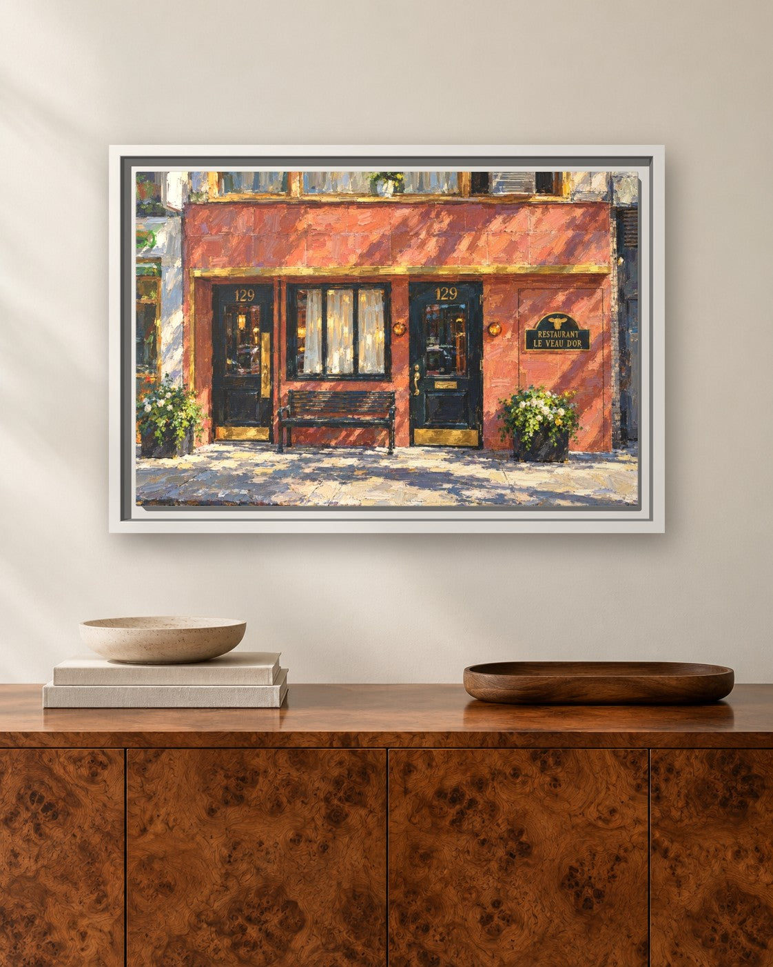 Le Veau d’Or framed canvas print hanging above a sideboard