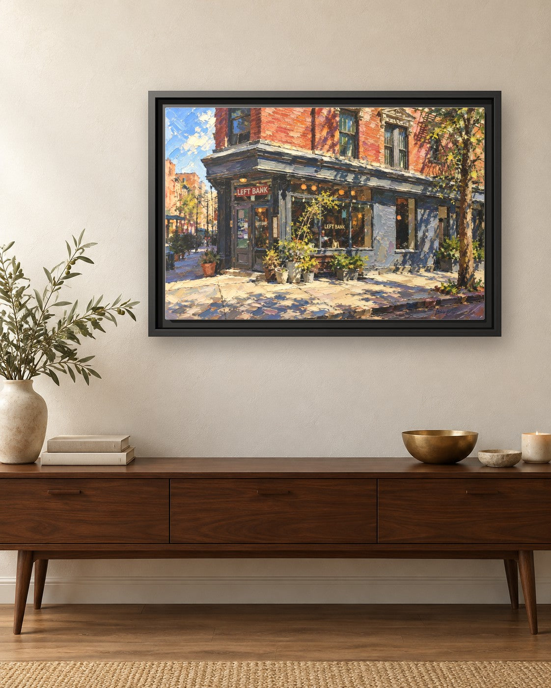 Left Bank framed canvas print hanging above a credenza
