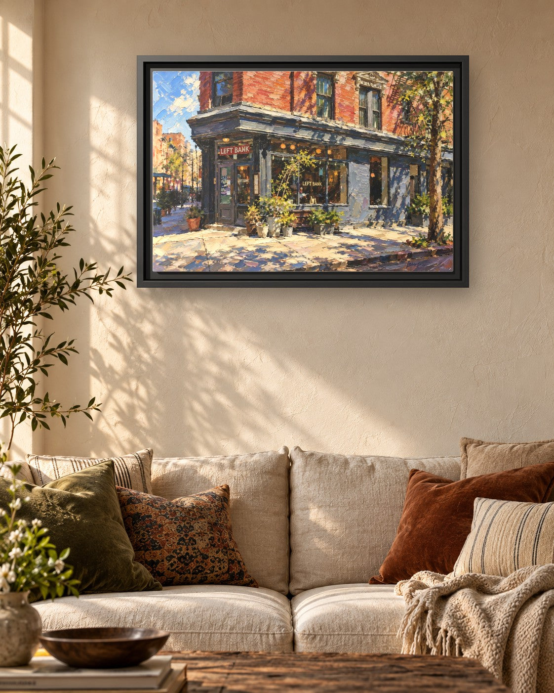 Left Bank framed canvas print hanging above a sofa