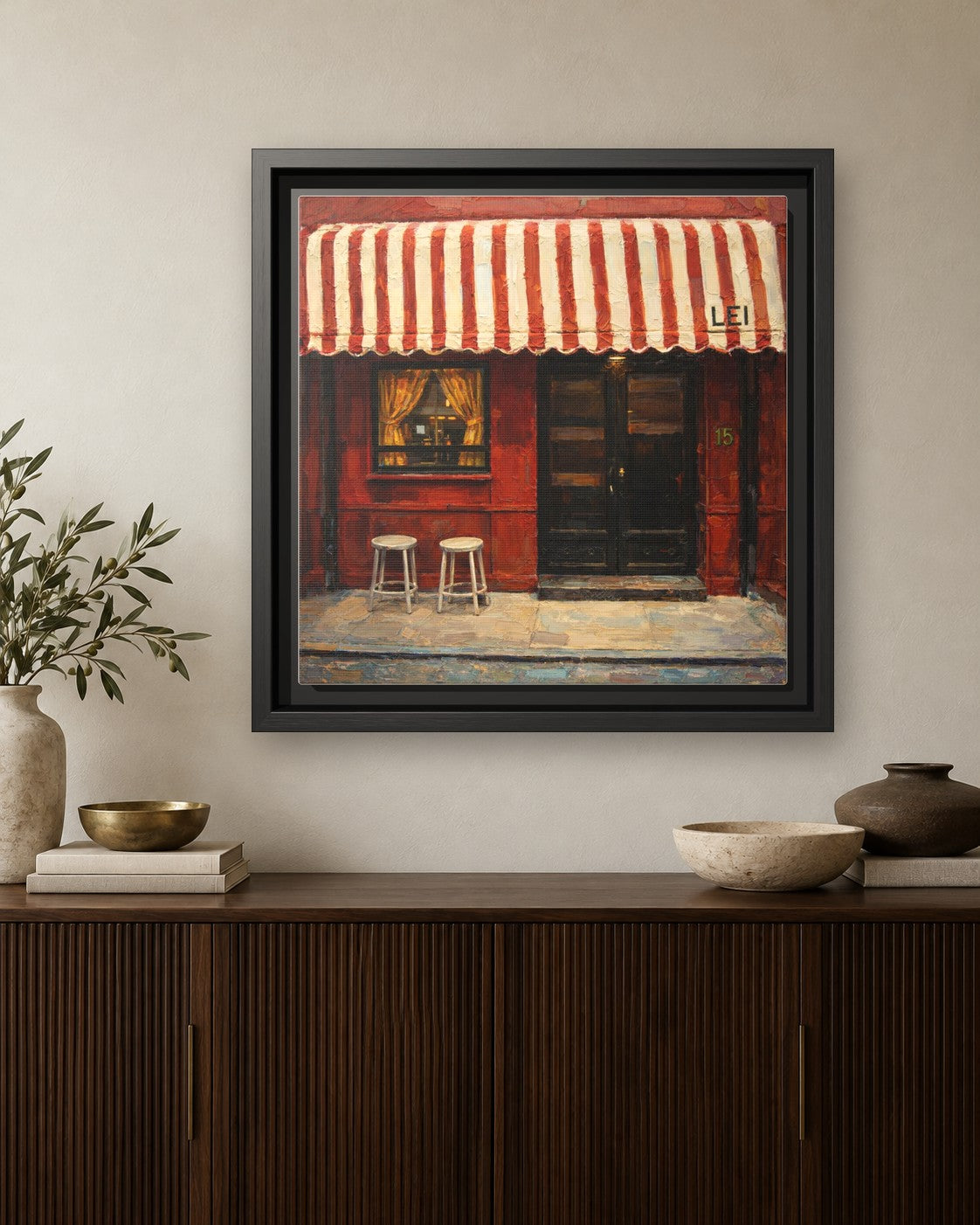 Lei framed canvas print hanging above a credenza