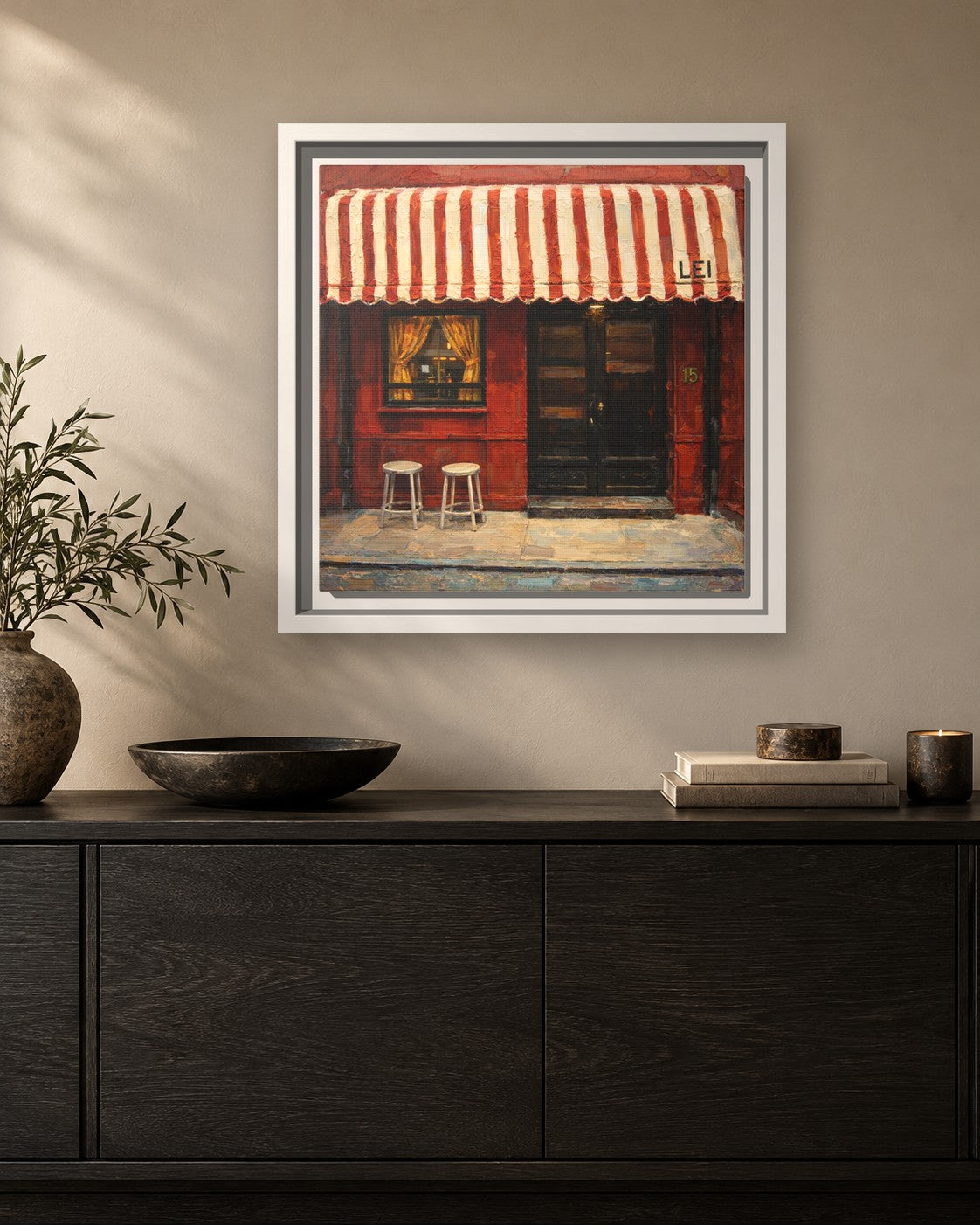 Lei framed canvas print hanging above a sideboard